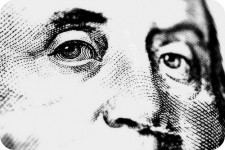 Close-up of face on currency note.