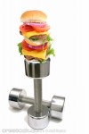 Burger stacked on a dumbbell.