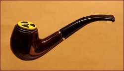 Pipe with radioactive symbol on top.