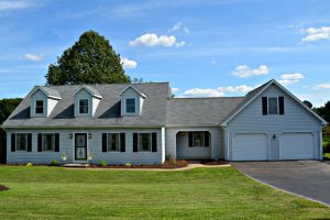 Single-story house with a spacious front yard.