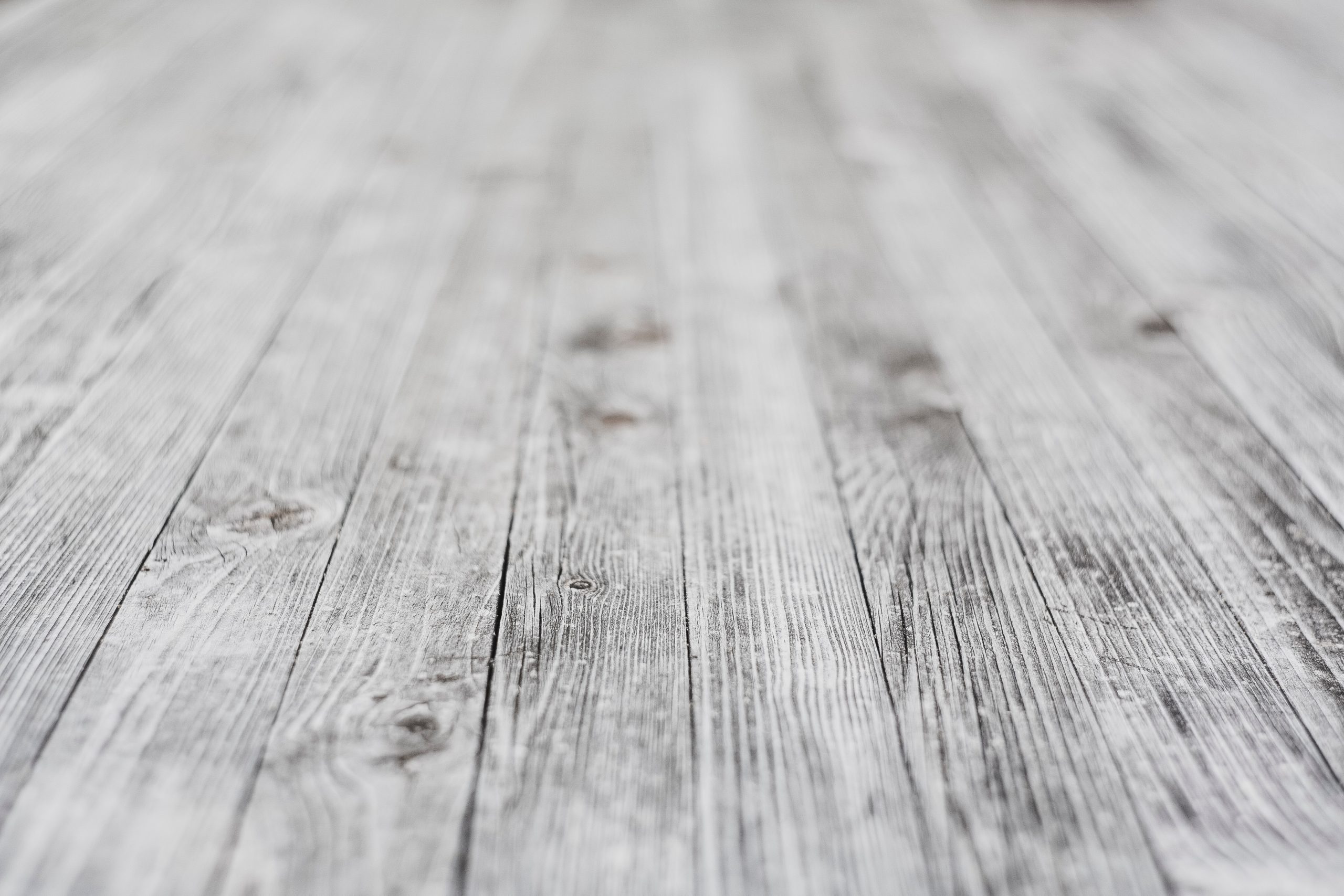 A close up of the wood grain on a table